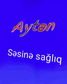 a blue background with aytan written in red