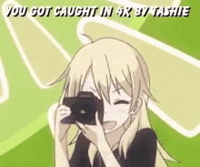 a girl is taking a picture with a camera and the words you got caught in 4k by tashie are above her
