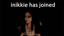 a picture of alice in wonderland with the words " inikkie has joined " above her