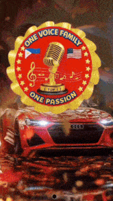 a red car is behind a one voice family one passion emblem