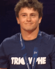 a young man wearing a shirt that says trick n phe on it