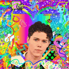 a picture of a young man with a cat and a rainbow in the background and the words just go on