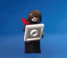 a lego figure has a picture of a man and the word true on it