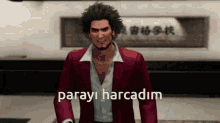 a man in a red suit is standing in front of a sign that says parayi harcadim
