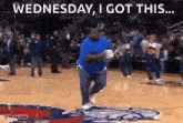 a man is running on a basketball court with the words `` wednesday , i got this ... '' behind him .