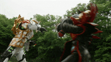 two monsters are fighting each other in the woods
