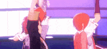 a group of anime characters are dancing on a stage .