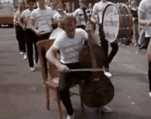 Woody Allen Take The Money And Run GIF - Woody Allen Take The Money And Run Cello GIFs