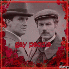 two men standing next to each other with the words gay people written in red letters
