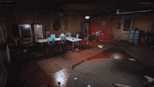 a room with tables and chairs and a sign that says babyzone