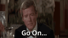 Go On For Your Eyes Only GIF - Go On For Your Eyes Only Roger Moore GIFs