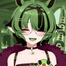 a girl with green hair and glasses holds a frog
