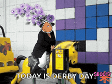 a picture of a woman riding a yellow horse with the caption today is derby day