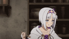a girl with short white hair is holding a spoon