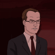 a man with glasses and a suit and tie looks angry