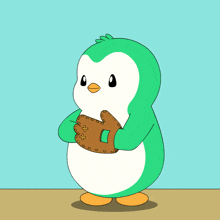a green and white penguin holding a baseball with a green star on it
