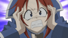 a girl with red hair and blue eyes is making a funny face with her hands on her head
