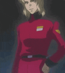 a man in a red uniform with a yellow stripe on the sleeve