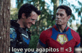 two men in superhero costumes are standing next to each other and one of them says i love you agapitos !! < 3