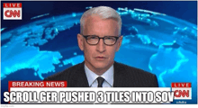 a man in a suit and tie is talking on a cnn news channel