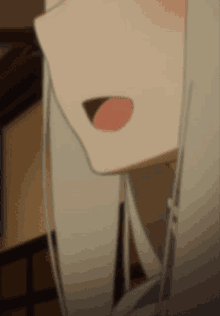 a close up of a person 's mouth with their tongue out