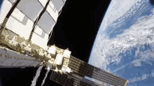 Earth And The Space Station GIF - Nasa Nasa Gifs Earth GIFs