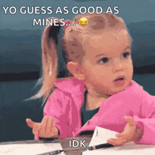 a little girl is making a funny face with the caption yo guess as good as mines idk