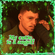 a picture of a man with the words " my cutie is a angel " on it