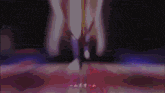 a blurry picture of a person 's feet with chinese writing in the corner