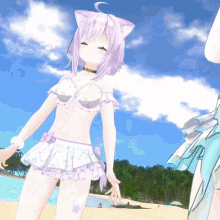 a girl with a cat ear is standing on the beach