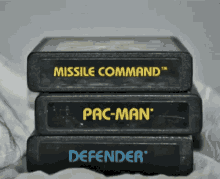 video game cartridge pac_man the arcade missle command atari