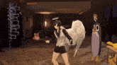 a video game character with angel wings holding a fox