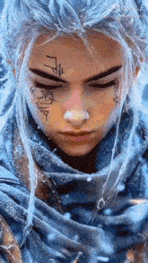 a woman with blue hair and a tattoo on her face is wearing a blue scarf .
