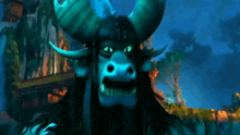 a cartoon character with horns and green eyes looks at the camera