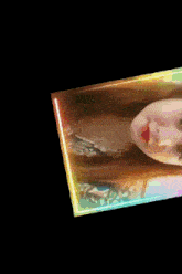 a picture of a woman with a rainbow frame around her face