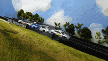 a race car is going down a track that says thunder mountain speedway on the side