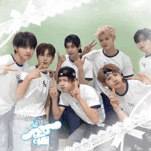 a group of young men are posing for a picture and one of them has a cinnamon bunny on his head