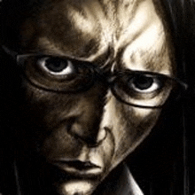 a close up of a person 's face with glasses and a serious look on their face .