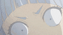 a close up of a person 's face with a circle in the middle of it