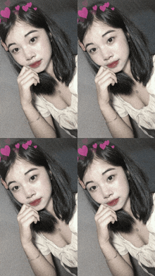 a girl with hearts on her head looks at the camera