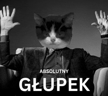 a black and white photo of a man with a cat 's head and the word glupek below him