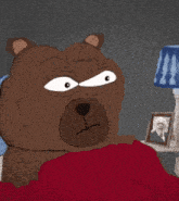 a cartoon bear is laying on a bed next to a lamp and a picture