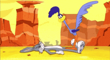bugs bunny is laying on the ground while the coyote stands over him
