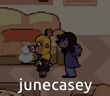 a pixel art of a girl sitting on a couch with the name junecasey on the bottom right
