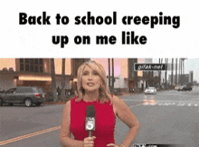 a woman in a red dress is holding a microphone with the words back to school creeping up on me like on the bottom
