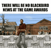 a man in a red shirt is dancing in front of a group of people who are watching a game awards event
