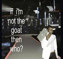 a man holding an apple laptop on a runway with the words if i 'm not the goat then who written below him