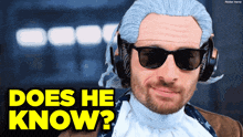 a man wearing sunglasses and headphones with the words does he know below him