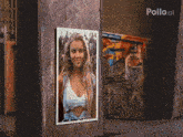 a picture of a woman on a wall with the word pollo.ai on the bottom right