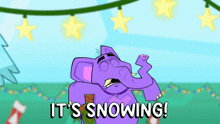 a cartoon elephant says it 's snowing with a christmas tree in the background
